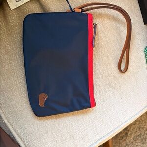 Dooney & Bourke Navy Clutch with Red Zip and Brown Wrist Strap